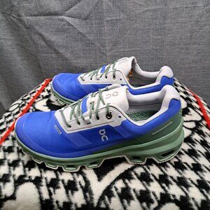 On Running Blue and Green Athletic Shoes